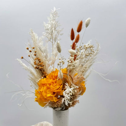 Spring awakening: enchanting dried flower bouquet with orange hydrangea