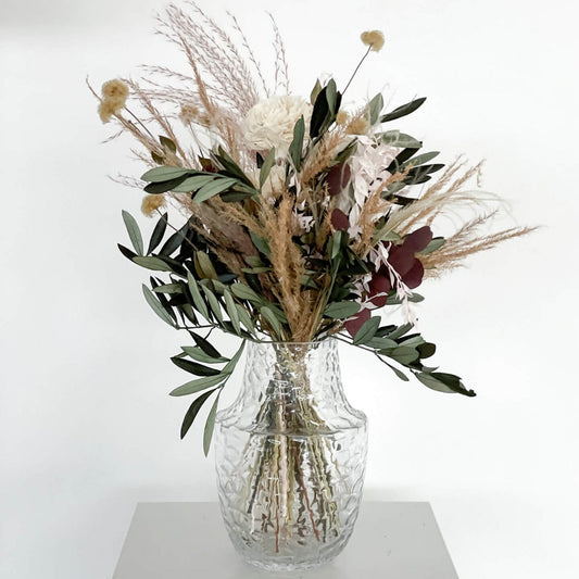 Modern naturalness: dried flower bouquet with olives, eucalyptus and pampas grass